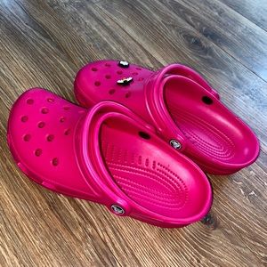 Electric pink Crocs